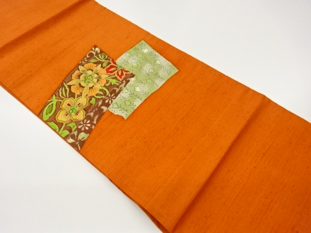 手織り紬金彩色紙に草花模様名古屋帯